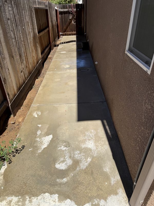 The same walkway rinsed spotless after the job — we clean up behind ourselves